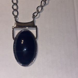 20 inch silver chain Lia Sophia necklace with a navy blue resin oval.